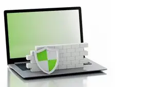 Laptop with brick wall serving as firewall for laptop computer.